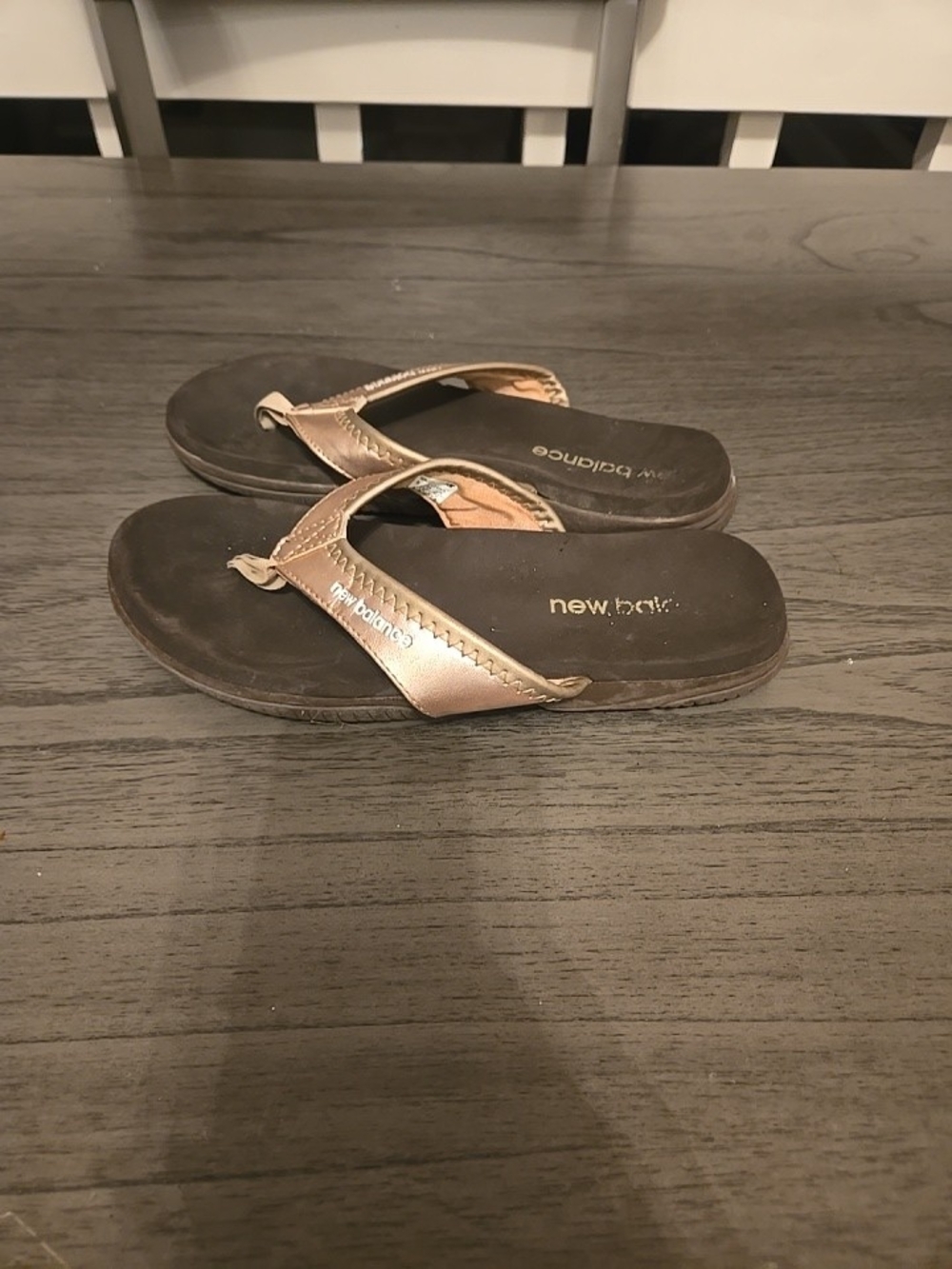 New Balance Womenās Bronze Metallic Flip Flop Sandals